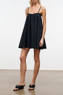 Black mini dress with spaghetti straps and gathered bust detail