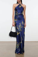 Midnight silk halter maxi dress with gold floral print and ruched waist