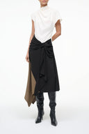 Two-tone midi dress with draped wrap waist, white top and black skirt