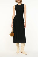 Black sleeveless midi dress with round neckline and pleated skirt