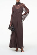 Women's dark-brown maxi dress with sheer long sleeves and V neckline