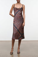 Silk slip dress with cowl neckline, dark chevron stripes in navy, coral, and light blue
