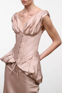 Silk top in sandrose with V neckline, button front, puff sleeves and waist tie