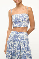 Blue toile print tank top with square neckline, adjustable spaghetti straps, cropped fit
