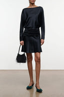 Black silk mini dress with ruched waist and long sleeves