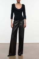 Black ruched long-sleeve top with gathered ruffle neckline