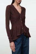 Brown V-neck button-up top with long sleeves and curved hem