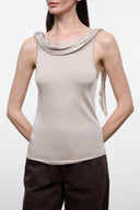 Champagne sleeveless draped cowl-neck top with fitted silhouette
