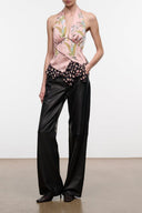 Pink silk halter top with multicolor bird print and ruffled hem