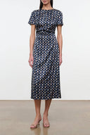 Navy patterned silk dress with short sleeves and tied waist, midi length