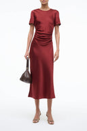 Marcel silk dress in sangria red, short sleeves, crew neck, fitted midi length