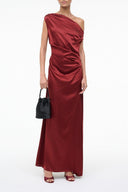 Sangria red silk maxi dress with one-shoulder draped bodice and side ruching