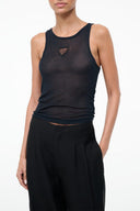 Black tank top with small heart logo at the chest