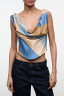 Draped sleeveless silk top with diagonal desert stripe in blue and tan