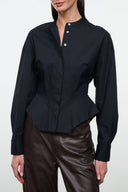 Black long-sleeve button-front top with short stand collar