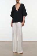 Black V-neck loose-fit t-shirt with short sleeves