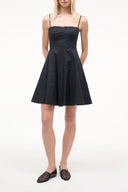 Black sleeveless mini dress with fitted bodice and flared skirt