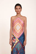 Patchwork halter maxi dress front view with pink diamond neckline and blue-orange skirt