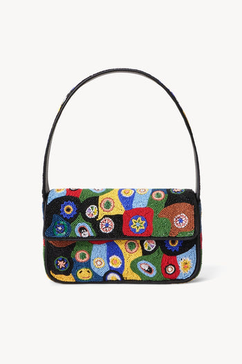Multicolor beaded shoulder bag with top handle and flap closure.